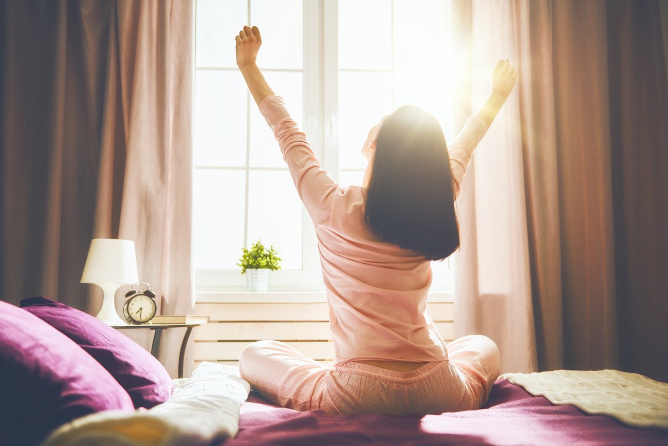 woman enjoying sunny morning